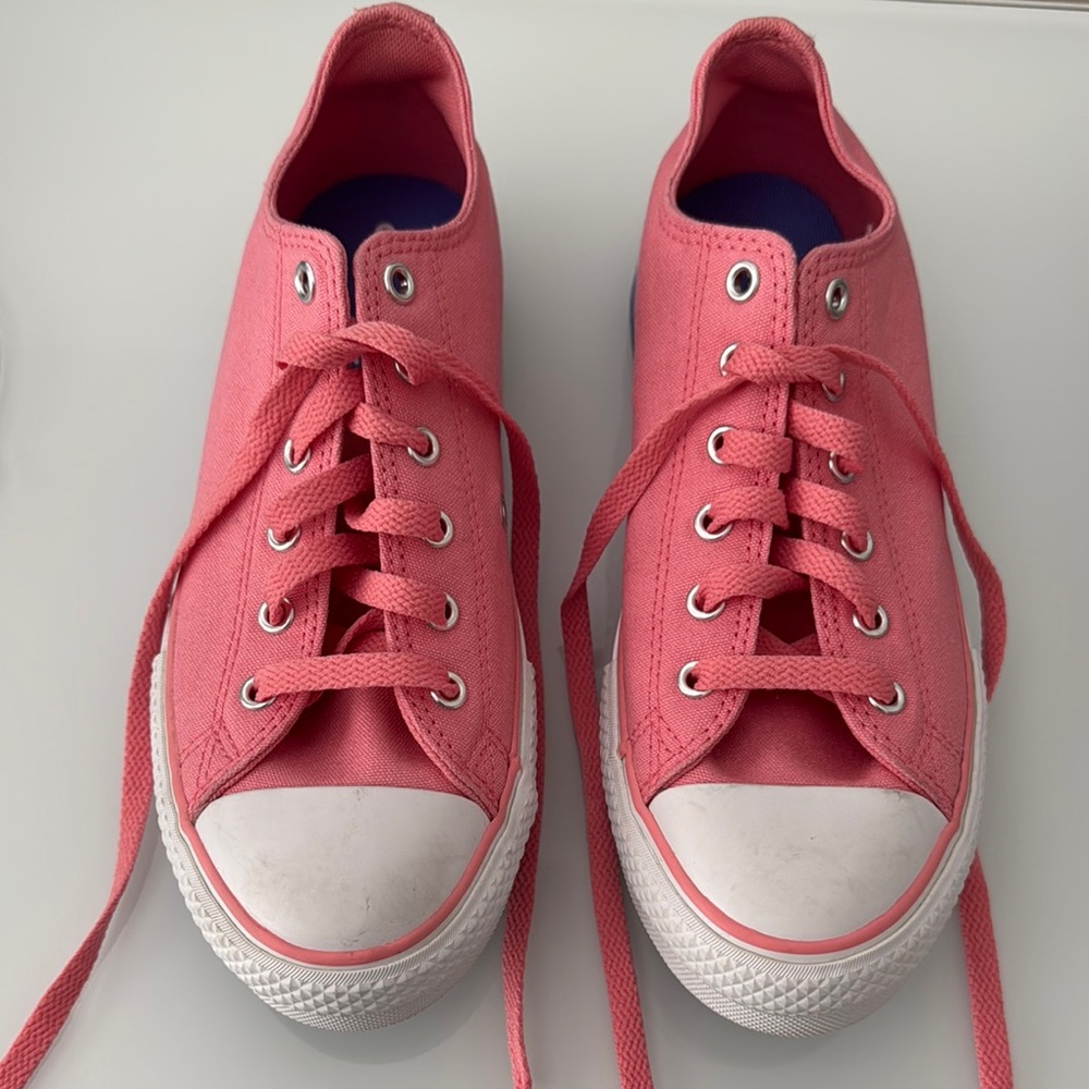 Converse all stars brand new. Pink Canvas Sneakers with white and purple trim.